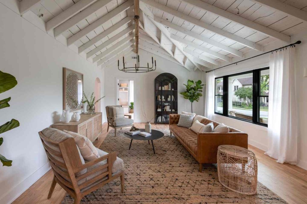 Warm rustic living room with vaulted ceiling