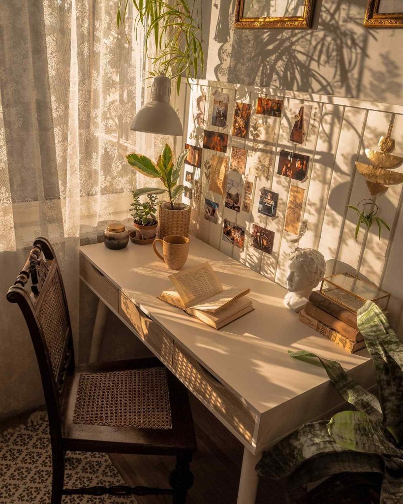 Vintage-inspired desk with a photo collage wall.