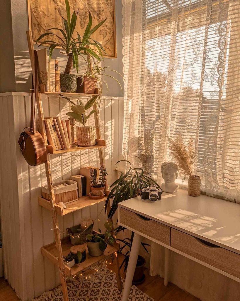 Rustic wooden shelf beside a bright and airy desk.