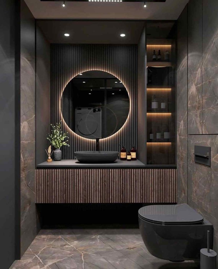 Sophisticated bathroom with backlit mirror and slatted wood details.