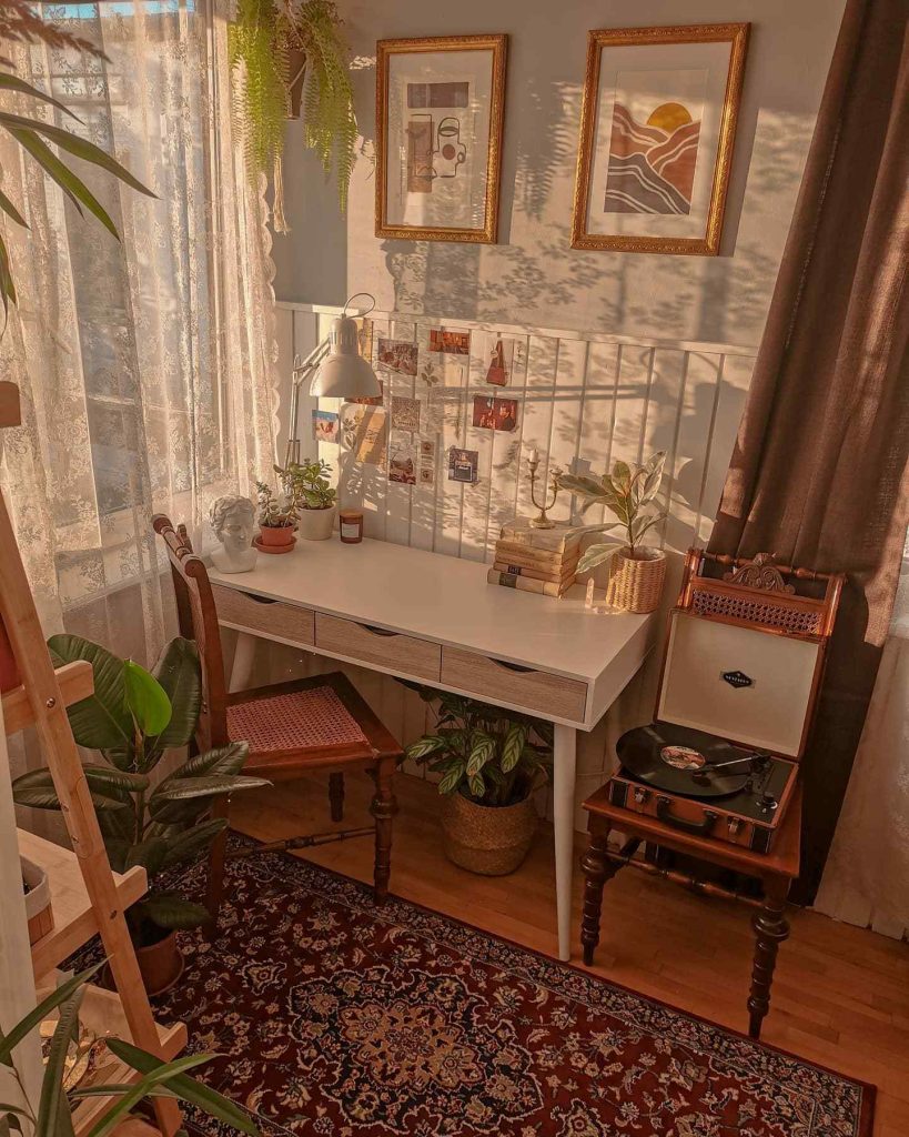 Vintage desk with a record player and warm tones.