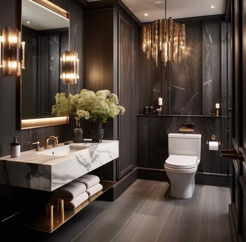 Elegant black bathroom with gold accents and marble sink