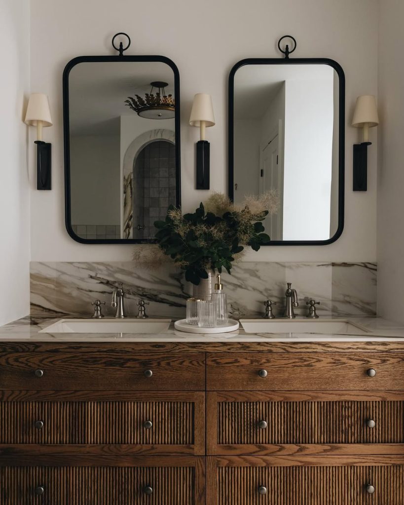 Double vanity with dark wood, ribbed texture, and black accents.
