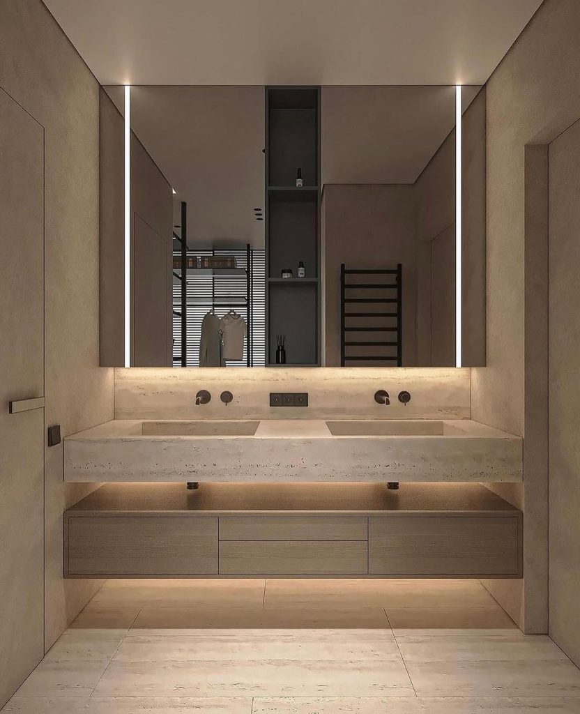 Sleek bathroom with ambient lighting and a floating vanity.
