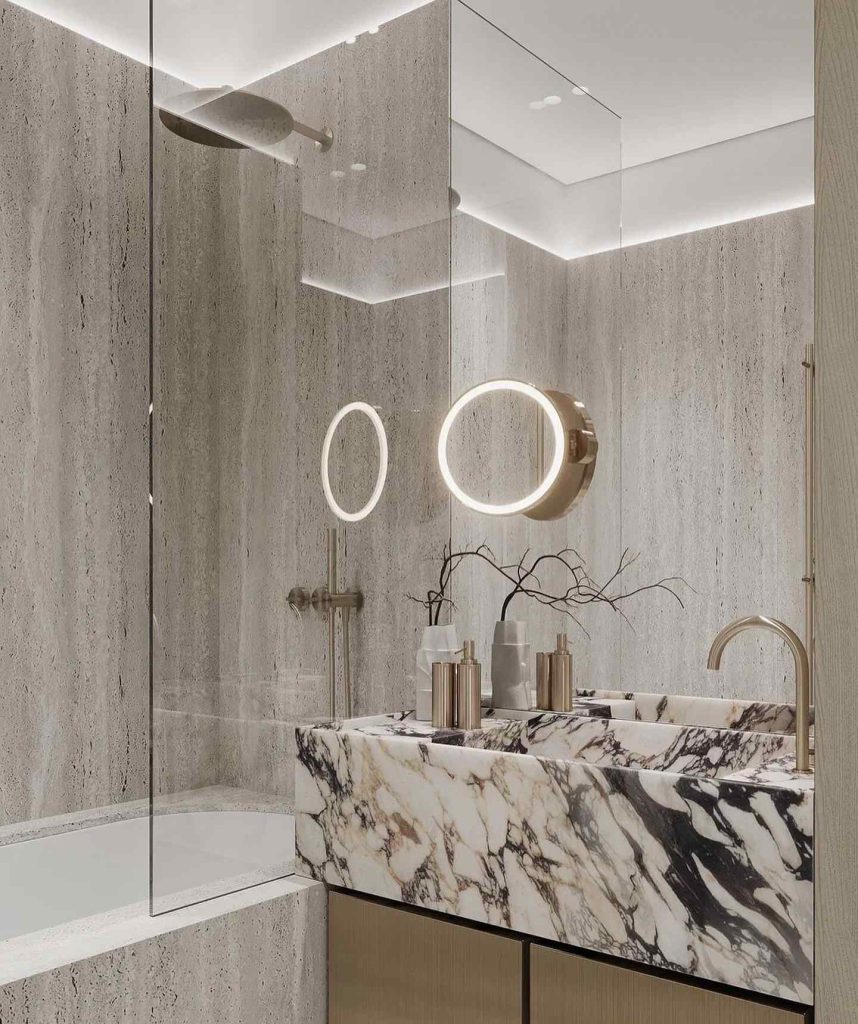 Minimalist bathroom with bold marble sink and textured walls.