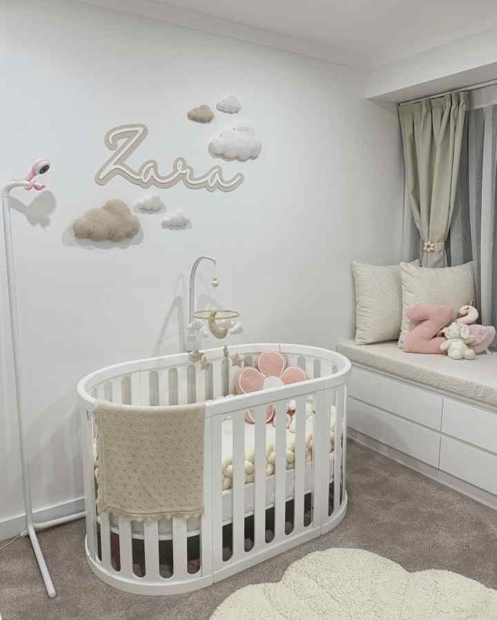 Minimalist cloud-inspired nursery with a personalized touch