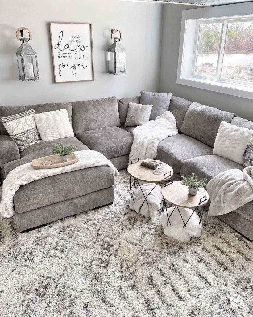 Rustic charm meets comfort in a grey sectional with layered textures.
