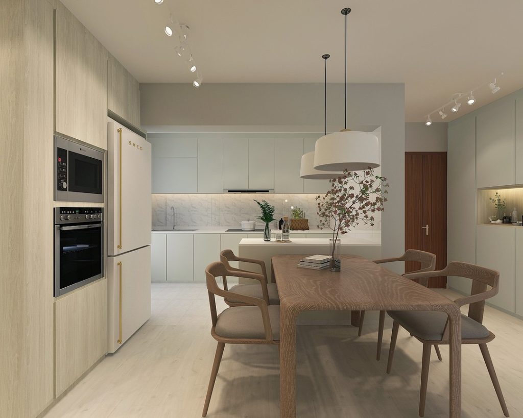 Minimalist kitchen with neutral tones and pendant lighting.
