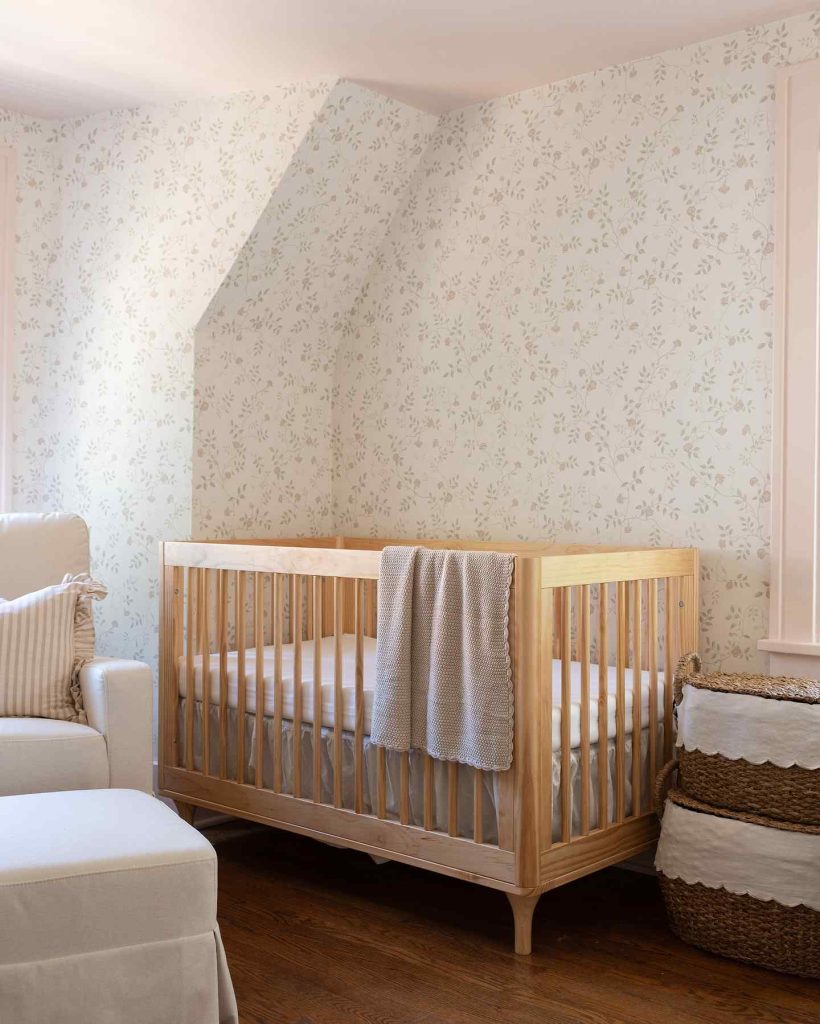 A charming space blending vintage and modern baby room styles.