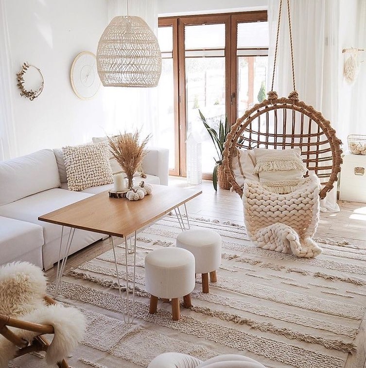 Scandinavian-style hanging chair with knits and warm tones.
