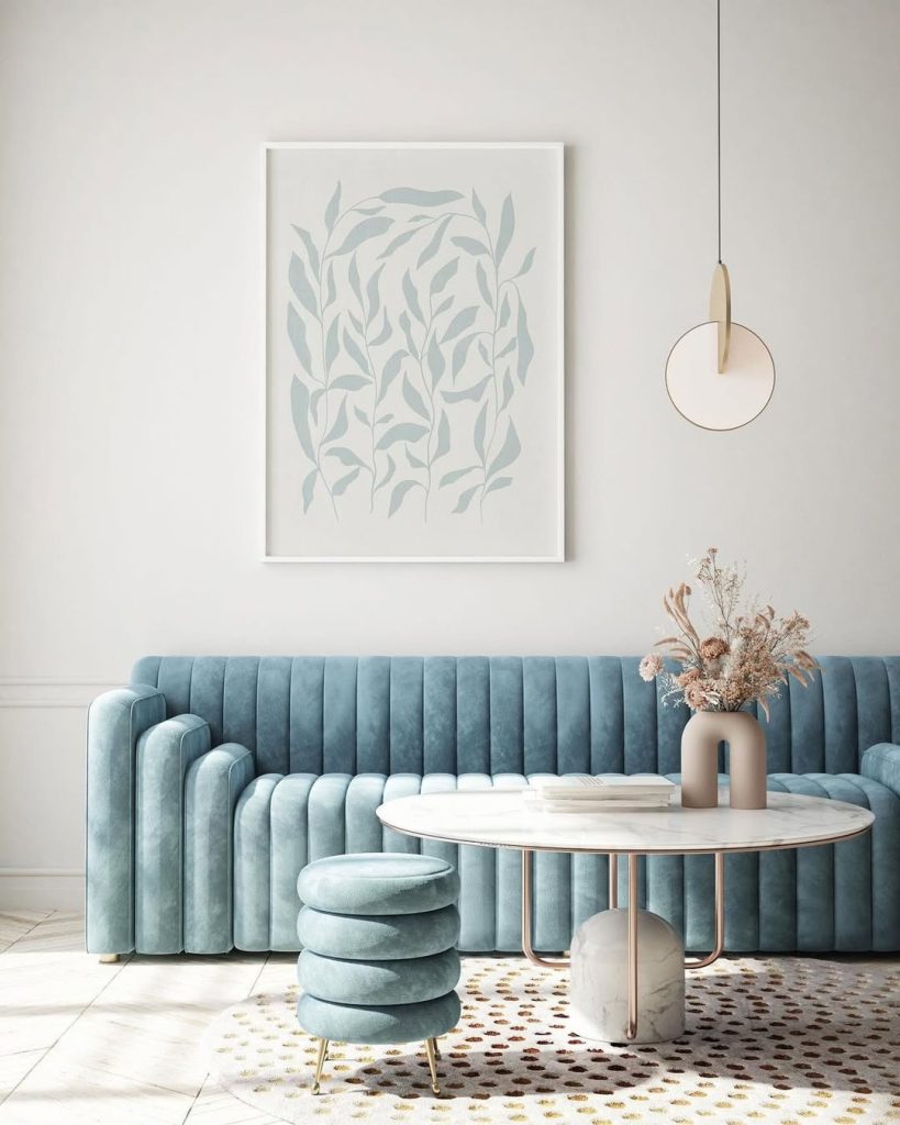 Navy blue walls with coral furniture and a stunning photo gallery for a stylish look