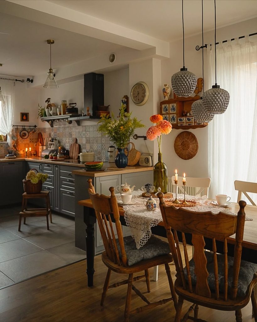 Minimalist small cozy kitchen with soft lighting, wooden countertops, and modern decor.
