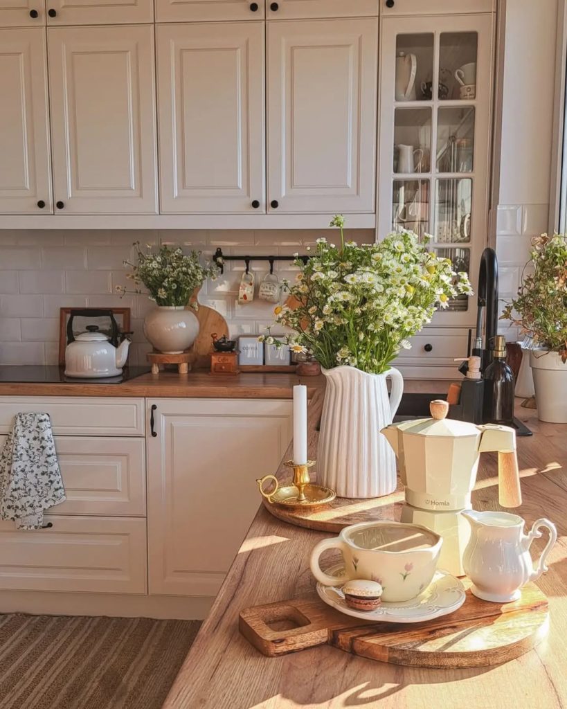 Charming vintage cozy kitchen with patterned tiles, candlelight, and rustic shelving.
