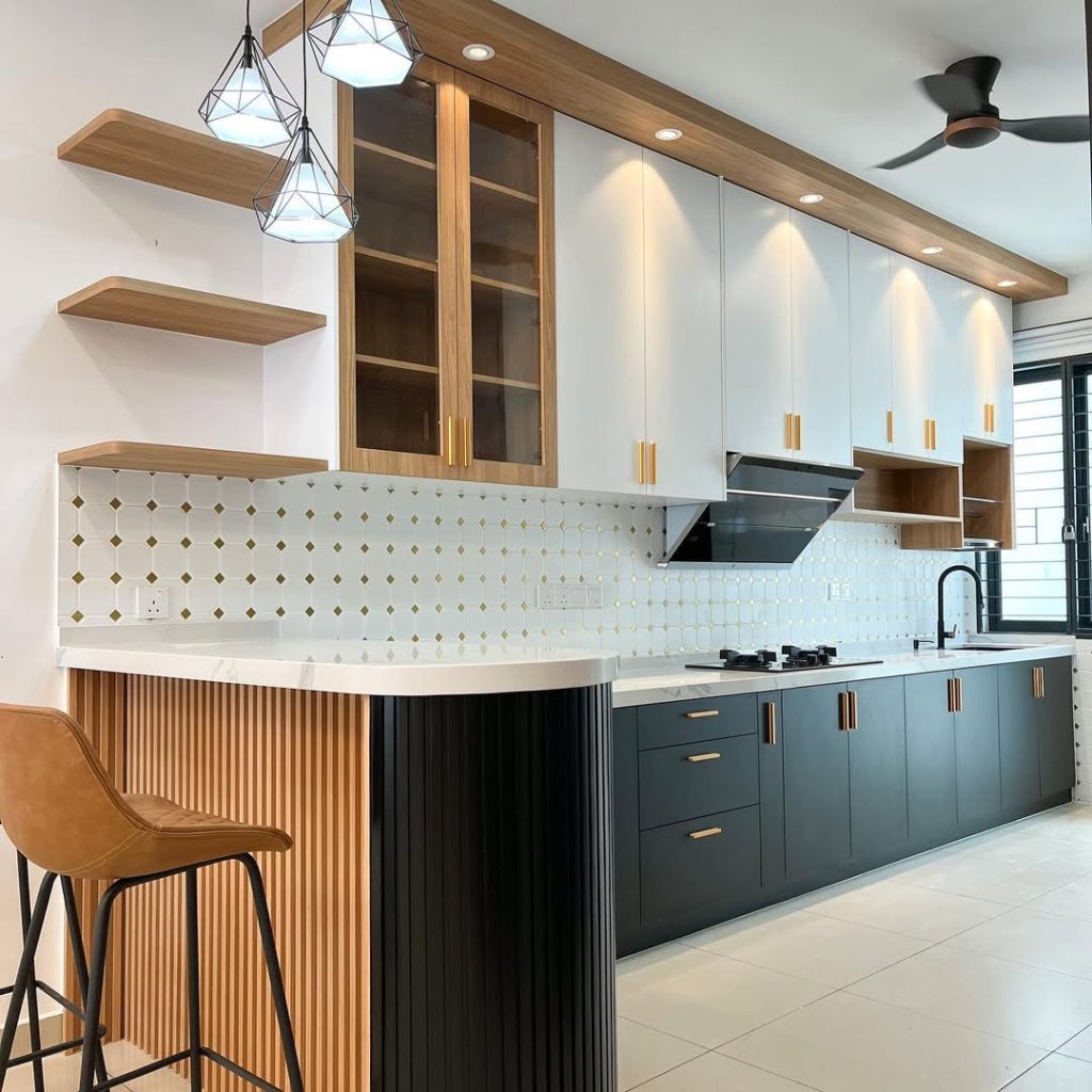 Two-tone black and white kitchen cabinets with wood open shelving and backsplash
