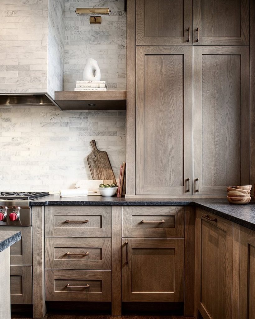 Luxury gray wood kitchen cabinet ideas with a marble backsplash for storage
