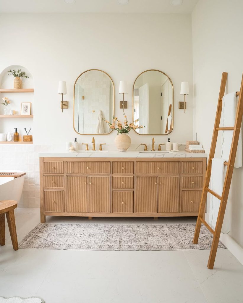 Bold red double vanity bathroom with marble top and vintage charm.
