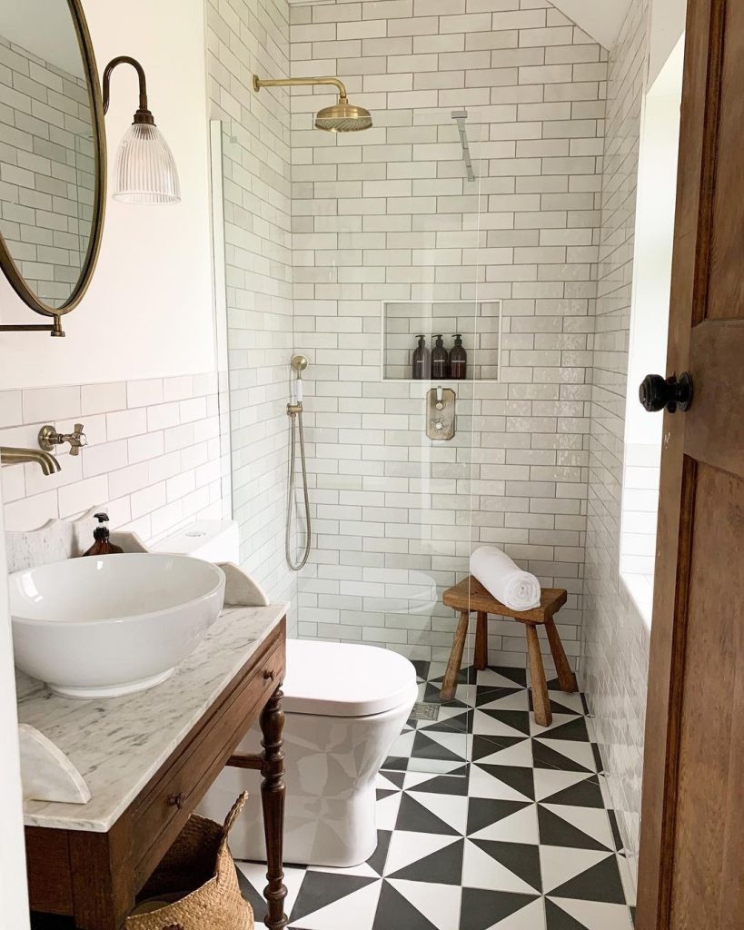 Compact, ultra-modern small bathroom with sleek neutral tones.
