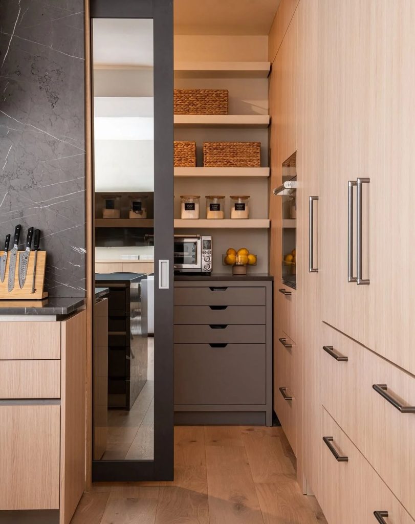 Hidden kitchen pantry ideas with sleek built-in cabinets and open shelving
